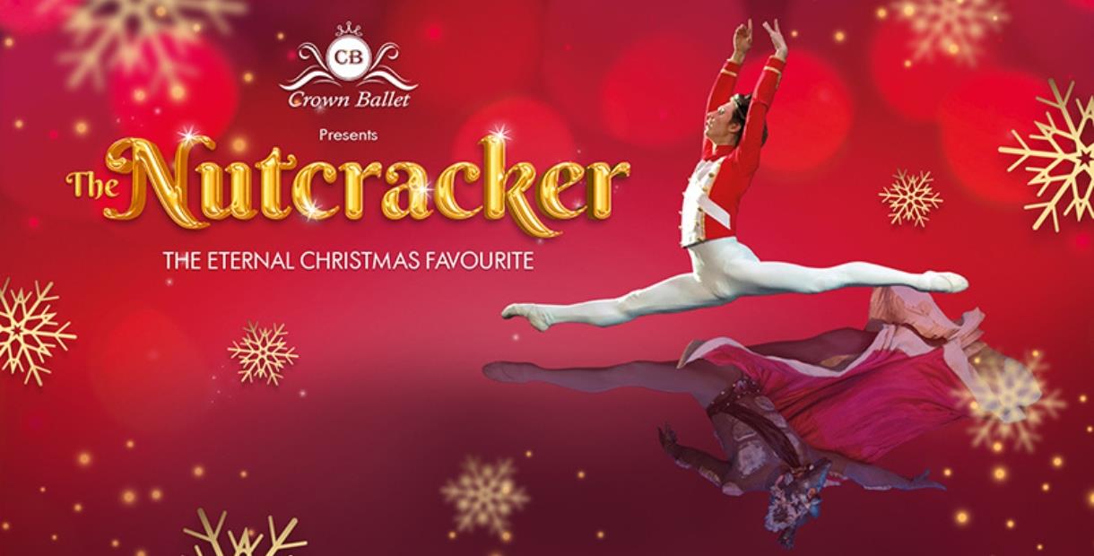 Ballet dancers on a red background with gold snowflakes