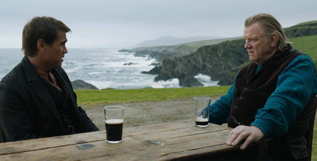 Colin Firth and Brendan Gleeson sat drinking stout with the Irish coastline in the background