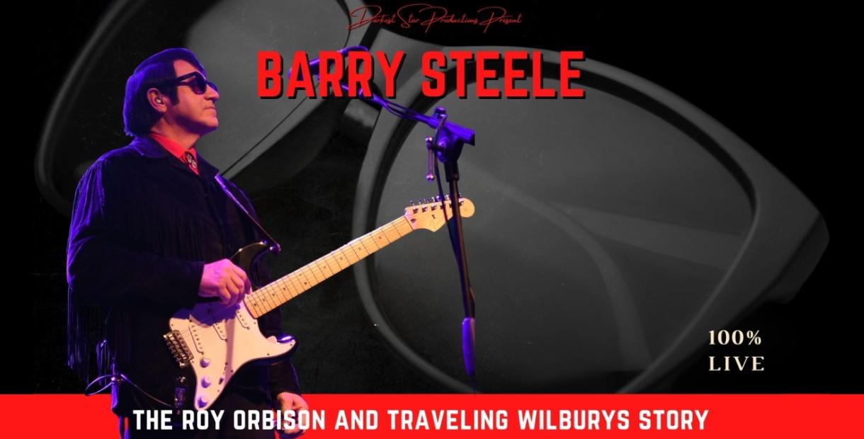 Barry Steele playing an electric guitar