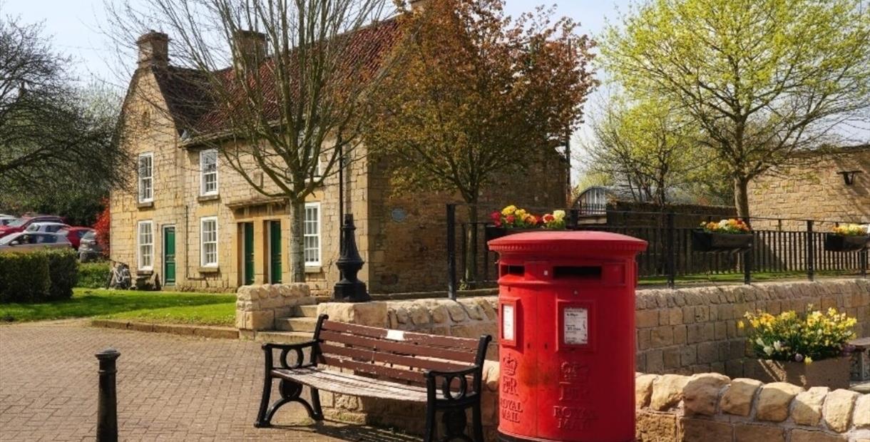 Bolsover town with red postbox in foreground