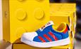Blue and red Adidas show on yellow box
