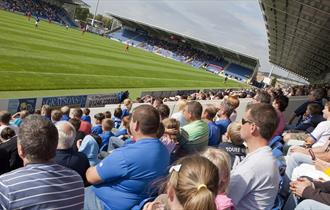 Crowds watching Chesterfield Football match