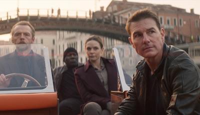 Tom Cruise, Simon Pegg and Rebecca Ferguson on a boat