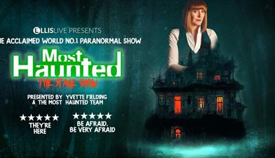 Yvette Fielding and a Haunted Mansion with a dark forest background