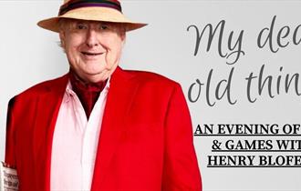 An image of Henry Blofeld with text that reads 'my dear old things, an evening of fun and games with Henry Blofeld'.