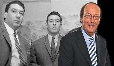 A black and white image of Ronnie and Reggie Kray stood side by side in suits looking at the camera with a colour picture of Fred Dinenage to the righ