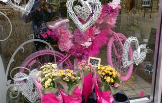 Window display at Thanks A Bunch Flowers and Gifts