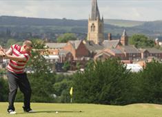Tapton golf course with Crooked Spire in the distance