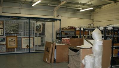 Artwork and boxes in a storage unit