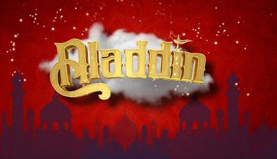 Golden Aladdin text on a red sparkly background with silhouettes of middle eastern buildings