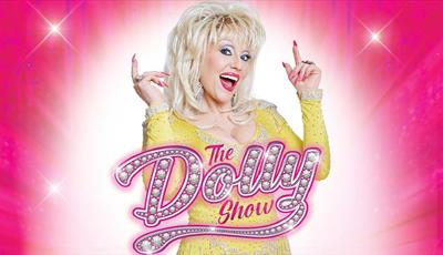 Kelly O'Brien as Dolly on a pink background with stars
