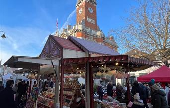A Market Stall selling sweets in front of Colchester Town Hall.