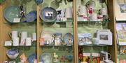Shop Display of bowls, mugs, earrings, cards and vases