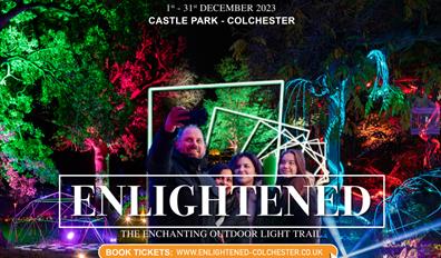 Enlightened image flyer - a family enjoying the trail among brightly illuminated trees.