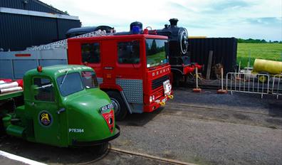Vintage steam train and fire engine