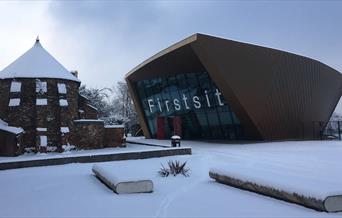 Firstsite, the back of the Minories Folly and the mosaic benches in the snow