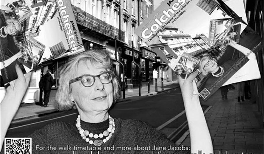 a photoshopped image of Jane Jacobs holding up Jane's Walk Colchester posters