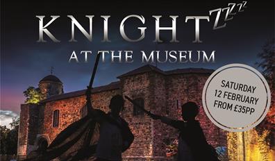Knights in front of Colchester Castle at night time