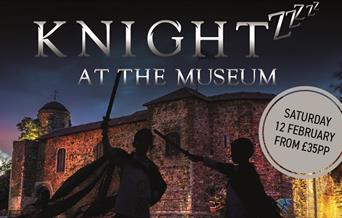 Knights in front of Colchester Castle at night time