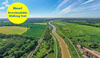The Wivenhoe trail runs beside the Colne (to the left in this image) snaking between Colchester and Wivenhoe.

TeXt reads "New! Downloadable Walking T