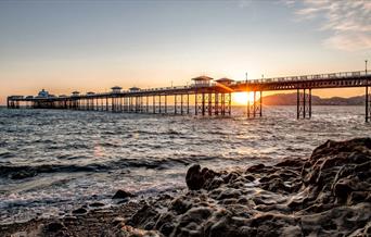 An image of Llandudno pier at sunset