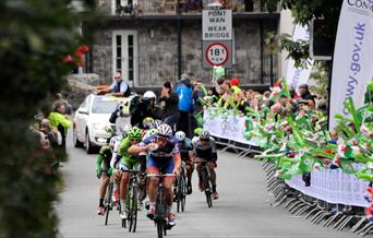 Cyclists riding through Llanrwst