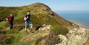 Walking down from the summit of Conwy Mountain with the sea in the distance