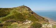 The top of Conwy Mountain, with Conwy Bay in the background