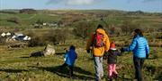 Family walking in the Hiraethog moors