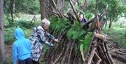 Family group den building