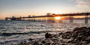 An image of Llandudno pier at sunset