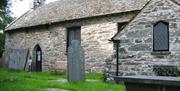 Entrance to St Michael's Old Church and some gravestones