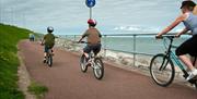 Cyclists on National Cycle Route 5 at Rhos-on-Sea