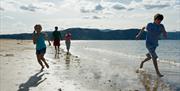 Family on West Shore Beach