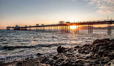 An image of Llandudno pier at sunset