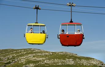 Image of 2 cable cars crossing each other