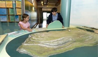Two children looking at the Great Orme model, Great Orme Country Park