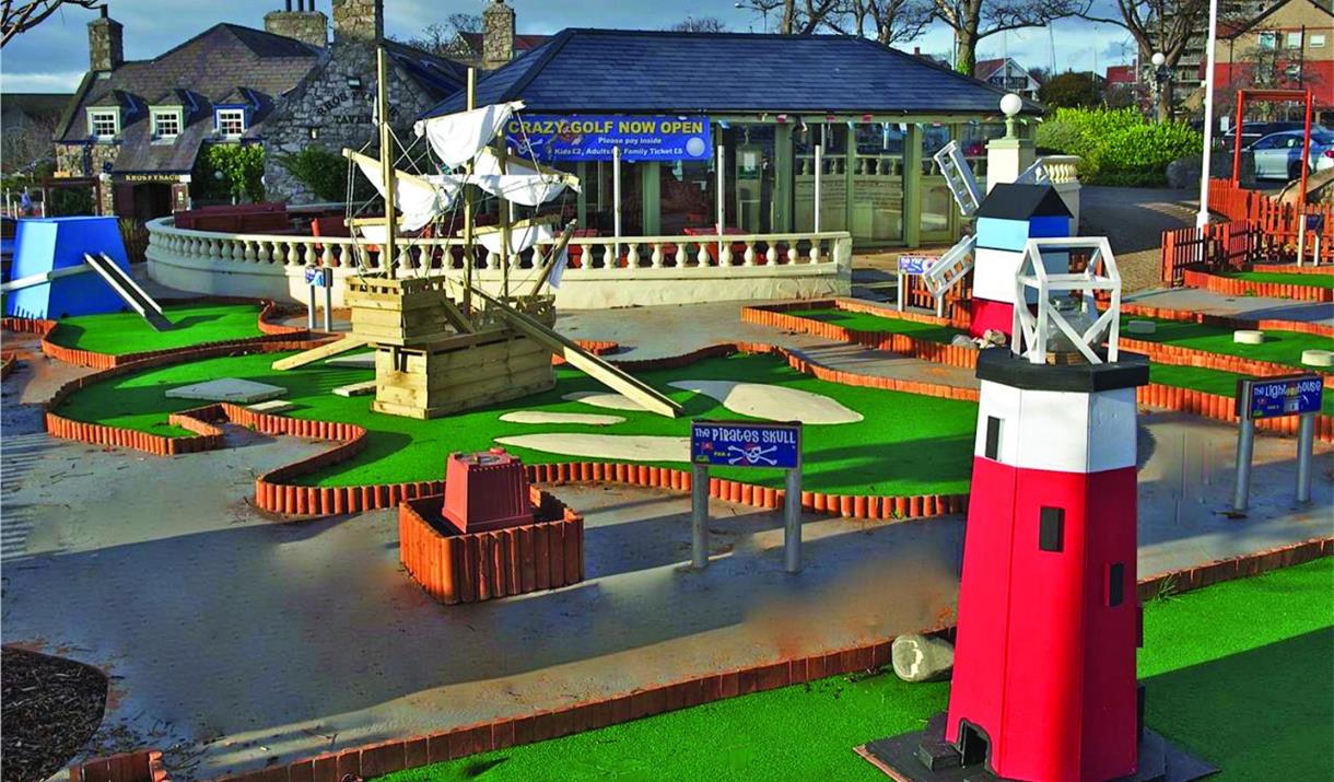 Pirate ship and lighthouse holes of crazy golf course