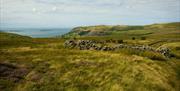 Remains of old walls on the hills overlooking Puffin Island and Llanfairfechan