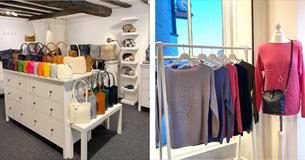 Inside La Bulle, a display of handbag and jumpers