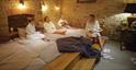 Group of ladies relaxing at The Vaulted Spa at the Kings Head Hotel, Cirencester
