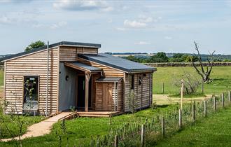 One of six new sunset lodges at Cotswold Farm Park