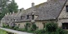 The beautiful Cotswolds village of Bibury, which you can explore on a Go Cotswolds guided tour of the Cotswolds