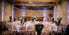 The Barn at Cogges Manor Farm set for a wedding (photo by Katie Hamilton)