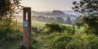 Way marker for Laurie Lee Walk in the Slad valley