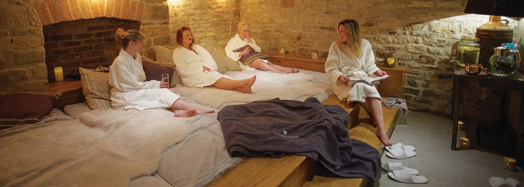 Group of ladies relaxing at The Vaulted Spa at the Kings Head Hotel, Cirencester