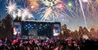 Large stage with spectacular fireworks behind