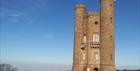 The quirky folly of Broadway Tower, which you can see on a Go Cotswolds guided tour of the Cotswolds