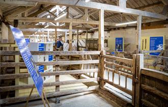 Information boards on display in converted farm buildings at the National Trust Heritage and Rural Skills Centre