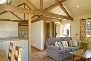 Grange Farm Country Cottages - the living area in Nine Acres